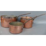 Three 19thC copper sauce pans and a lid to suit the mid size example,