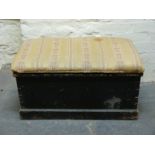 A 19thC stained pine trunk with fabric top,