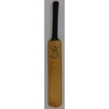 A miniature cricket bat signed by Nottinghamshire and Kent county cricket teams