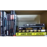 A large collection of James Bond coffee table size books etc together with other movie books,