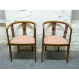 A pair of inlaid Edwardian tub chairs