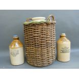 Stoneware flagons for Liverpool, Bolton and Monton, the Liverpool example in cane basket,