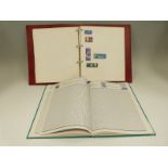 An album containing world stamps together with an empty Stanley Gibbons Collection album and an