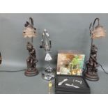 Two modern figural lamps, a glass drinks set, nativity,
