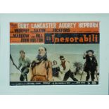 A vintage Italian film poster Gli Inesorabili starring Burt Lancaster and Audrey Hepburn,