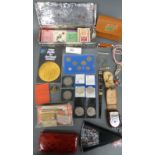 A quantity of collectables including coins, rail tickets, playing cards,