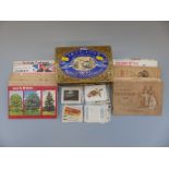 An assortment of cigarette and tea cards to include railway engines & cricketers,