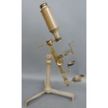 A 19thC Dollond of London microscope with extra lenses,