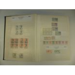 A collection of Hong Kong stamps in an album and stockbook, mainly Queen Elizabeth II,