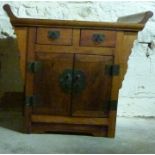 A small elm Chinese cabinet,