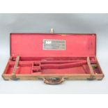 Alexander Henry canvas and leather case for double barrelled side by side gun with brass corners,