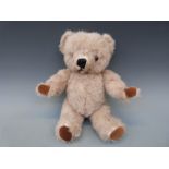 Three vintage teddy bears including a jointed mohair example,