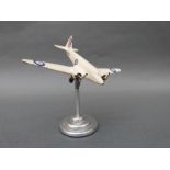 A model Airspeed Envoy aeroplane an chrome base,