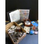 A quantity of collectables including corkscrews, hip flasks, paper weights,