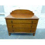 An Edwardian inlaid dressing chest of three graduated drawers,