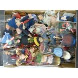 A large collection of dolls of the world together with a Norah Wellings felt doll and a miniature