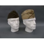 Two US military garrison caps, one marked Winkeller Joseph 11114698,