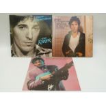 A small collection of albums including Bruce Springsteen, Ry Cooder, Yes, Hawkwind and Crosby,