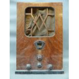 An Art Deco wireless in wooden cabinet with Bakelite knobs,