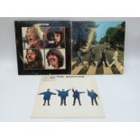 A box of albums including The Beatles,
