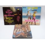 A collection of Cliff Richard albums,