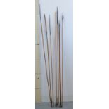 A collection of vintage fishing rods, bank sticks, Mathews split cane,