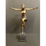 A bronzed Art Deco dancer on original plinth,