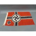 A Nazi German Kriegsmarine flag with indistinct maker's mark to edge and swastika with M below to