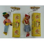 Two Pelham Puppets SM Minstrel and SS Dutch Girl both in original boxes