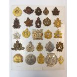 A collection of Canadian military badges including some rarities,