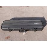 A hard gun flight case with padded interior, 110x40x14cm.