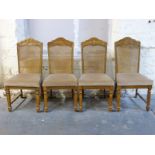 Four upholstered bergere dining chairs