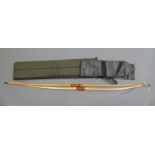 Two wooden laminated longbows,