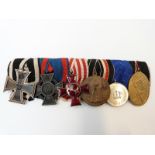 WWI group of six German medals comprising Iron Cross, Oldenburg Freidrick August Merit Cross,