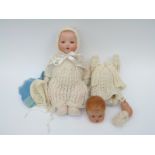 Armand Marseille bisque headed doll with open mouth, weighted blue eyes,