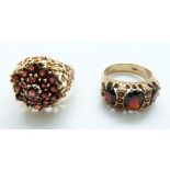 A 9ct gold ring set with garnets and another 9ct gold ring set with garnets in a cluster,