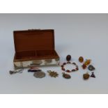 A collection of silver jewellery set with pressed amber,