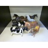 A collection of Beswick animals including Welsh Mountain pony, Dartmoor, Friesian,