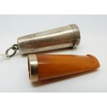 An amber cheroot holder with a 9ct gold collar in hallmarked silver holder