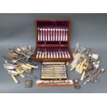 A cased mother of pearl handled dessert service, silver handled butter knives, plated cutlery,