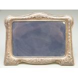 A modern hallmarked silver mounted photograph frame to suit 4 x 6 inch photograph,