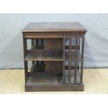 A oak revolving bookcase top