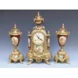 FHS of Germany brass and ceramic clock garniture in the Sevres style,