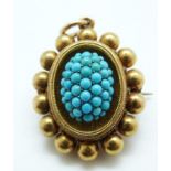 A Victorian yellow metal brooch/ pendant set with turquoise cabochons