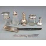 A quantity of hallmarked silver and white metal items to include hallmarked pepper,
