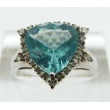 A 9ct white gold ring set with apatite surrounded by diamonds, size O/P, 3.