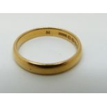 A 22ct gold wedding band, 4.