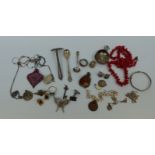 A hallmarked silver pusher, silver jewellery including Poetry pendant, bangle, bracelet, locket,