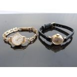Two ladies wristwatches, one Avia 9ct gold with gold hands and baton markers, silver face,