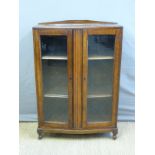 A glazed oak bookcase,